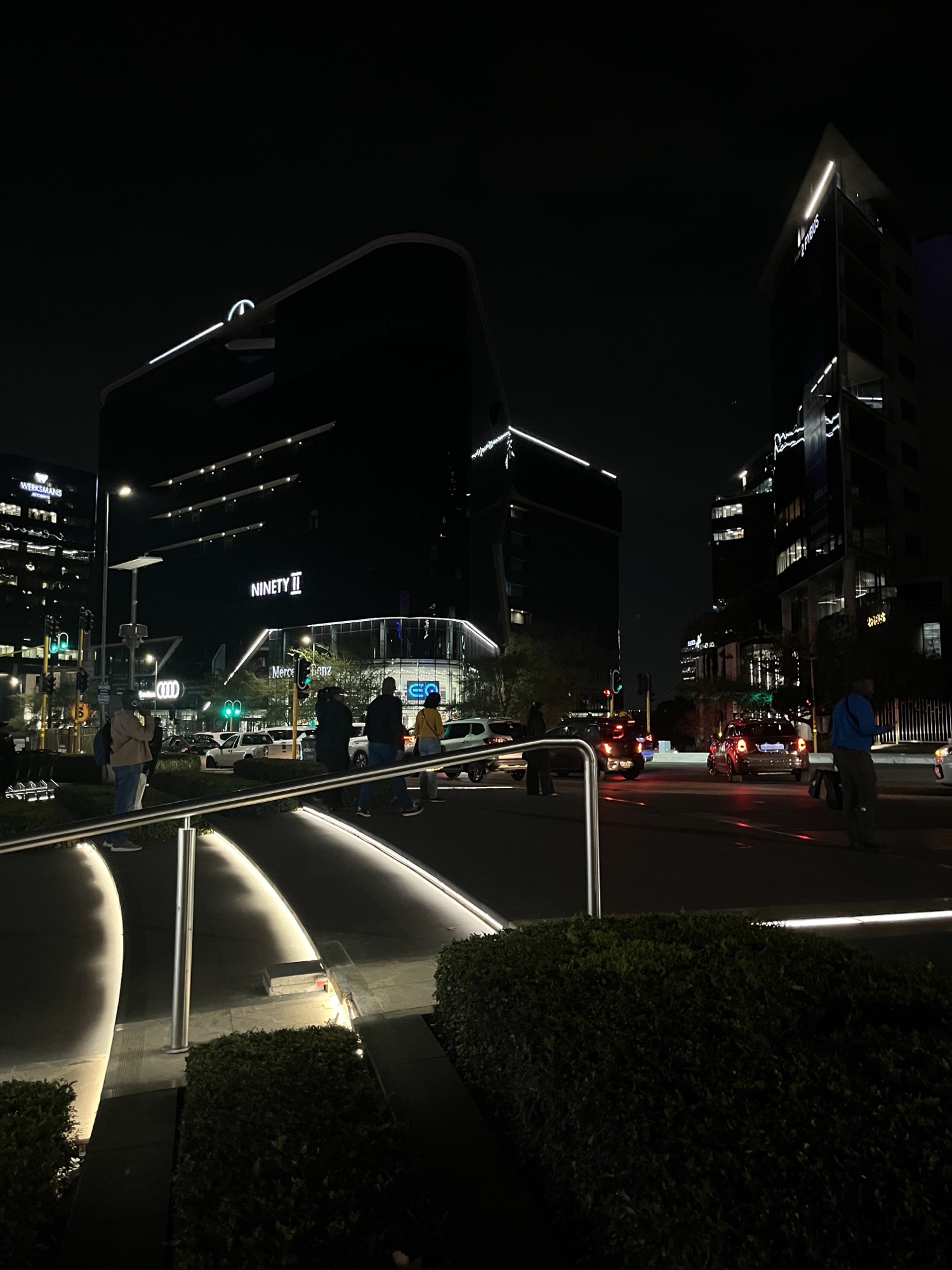 Modern city skyline lit up at night